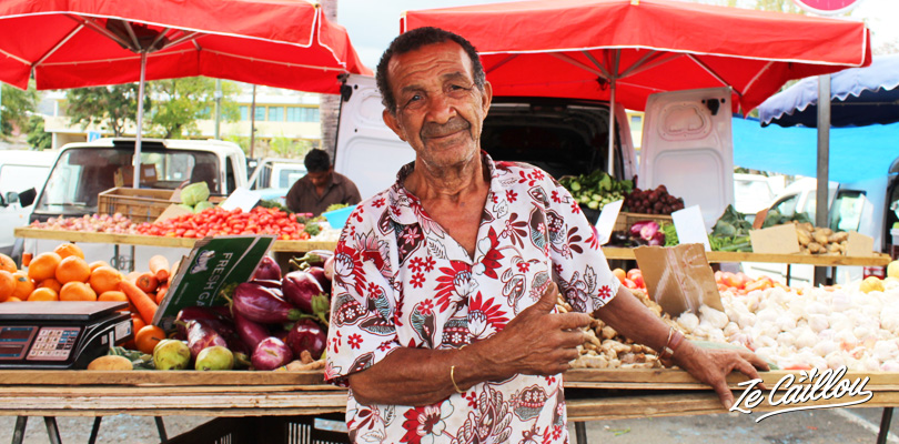Fruits and veg creole merchant of Reunion Island on the Saint-Paul famous market
