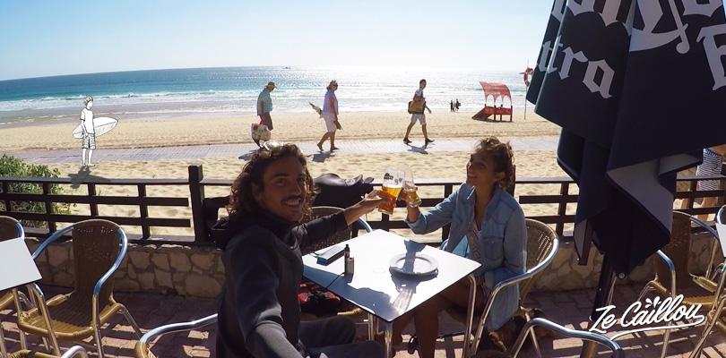 Have a drink after a surf session in Nazare, perfect surf spot in Portugal