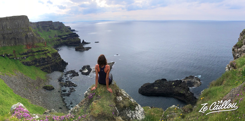 Appreciate the panoramic view over irish cliffs during the Giant's Causeway walk