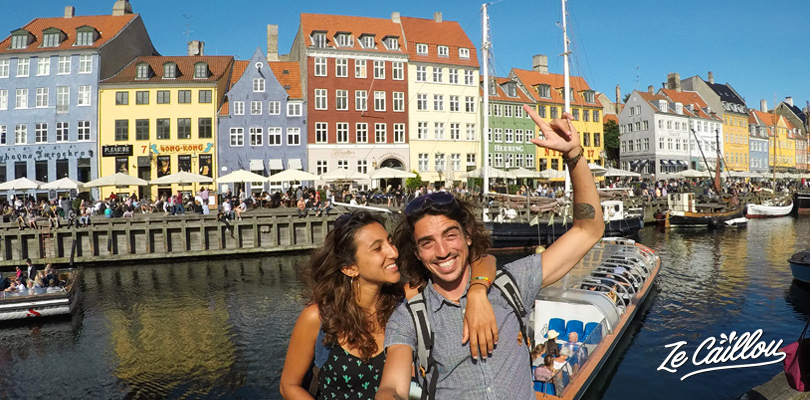 Nyhavn street, a touristic place in Copenhagen with its colorful houses and bars