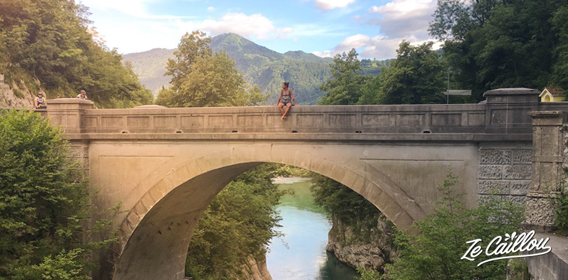 Romain on the Napoleon bridge in Kobarid, Slovenia, during our roadtrip in Slovenia by van.