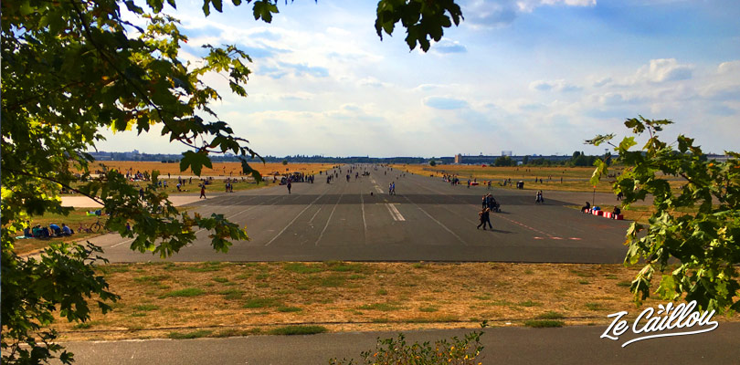 Berlin with a van, parked at Tempelhof park, a former airport with still its landing strips.