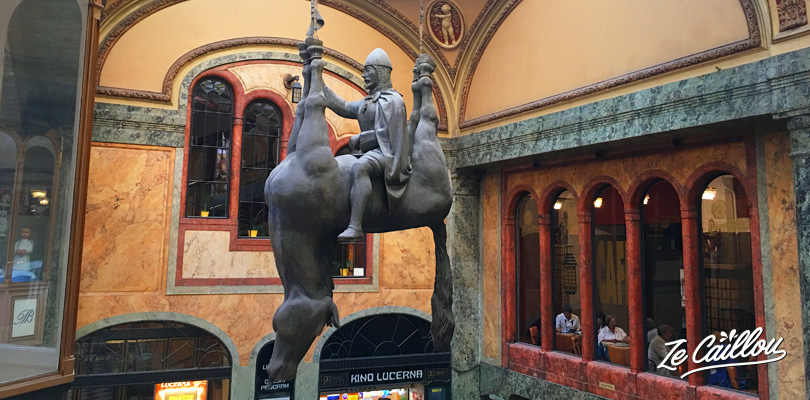 David Cerny's works like the Saint Venceslas statue that rides his horse upside down in the Lucerna path